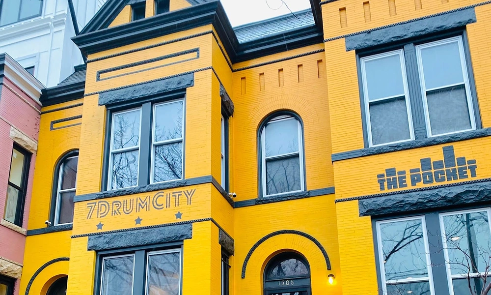 7Drum City Building yellow townhouse