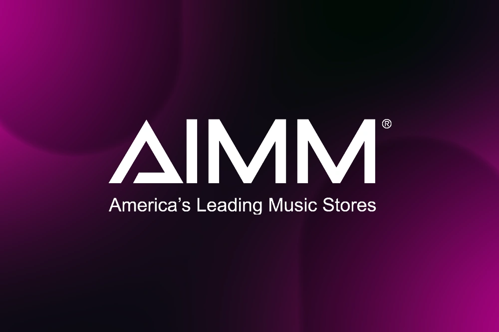 Pink Gradient Background with AIMM Logo overlay - America's Leading Music Stores